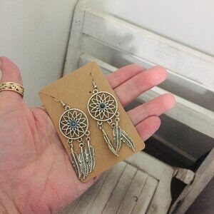 Silver dream catcher blue dangle earrings